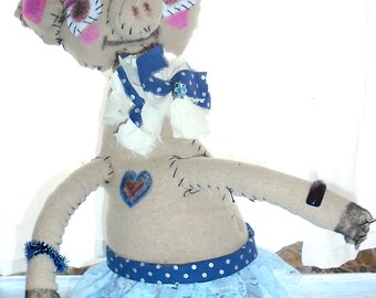 Miss Pig adventure pig in blue because no one wants to be mistaken as a Maga Maggot.
