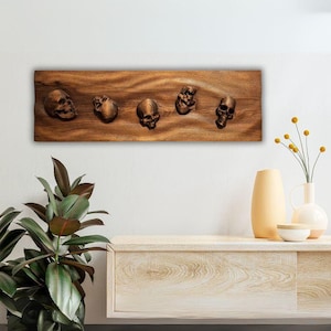Hand-Carved Gothic Skull Wall Art: Dark Wood Macabre Sculpture