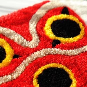 Close up detail of Mononoke tufted rug texture, high pile acrylic yarn