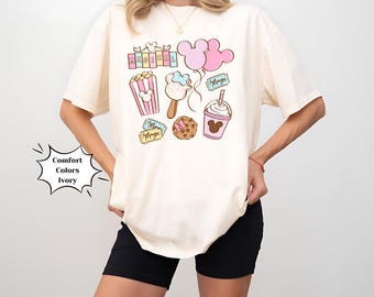 Shirt Magical Park Snacks, comfortabele kleuren, Bella canvas, groene kleurstelling, roze kleurstelling