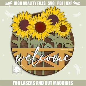 May include: A wooden welcome sign featuring sunflowers, green foliage, and a brown backdrop. The word "welcome" is in white script over a yellow fence. The sign is designed for laser and cut machines.