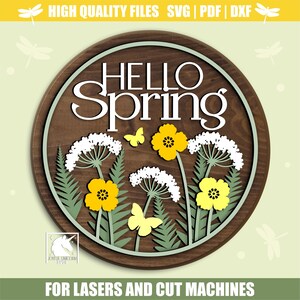 May include: A round wooden sign with the words "HELLO SPRING" in white. The sign features yellow flowers, white wildflowers, green ferns, and yellow butterflies. The text "HIGH QUALITY FILES SVG | PDF | DXF" is at the top, and "FOR LASERS AND CUT MACHINES" is at the bottom.