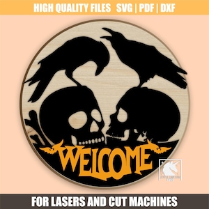 May include: A round wooden sign with a Halloween theme. The design features two black ravens perched above two black skulls. The word "WELCOME" is in orange, with bats on either side. Text at the top reads "HIGH QUALITY FILES SVG | PDF | DXF".
