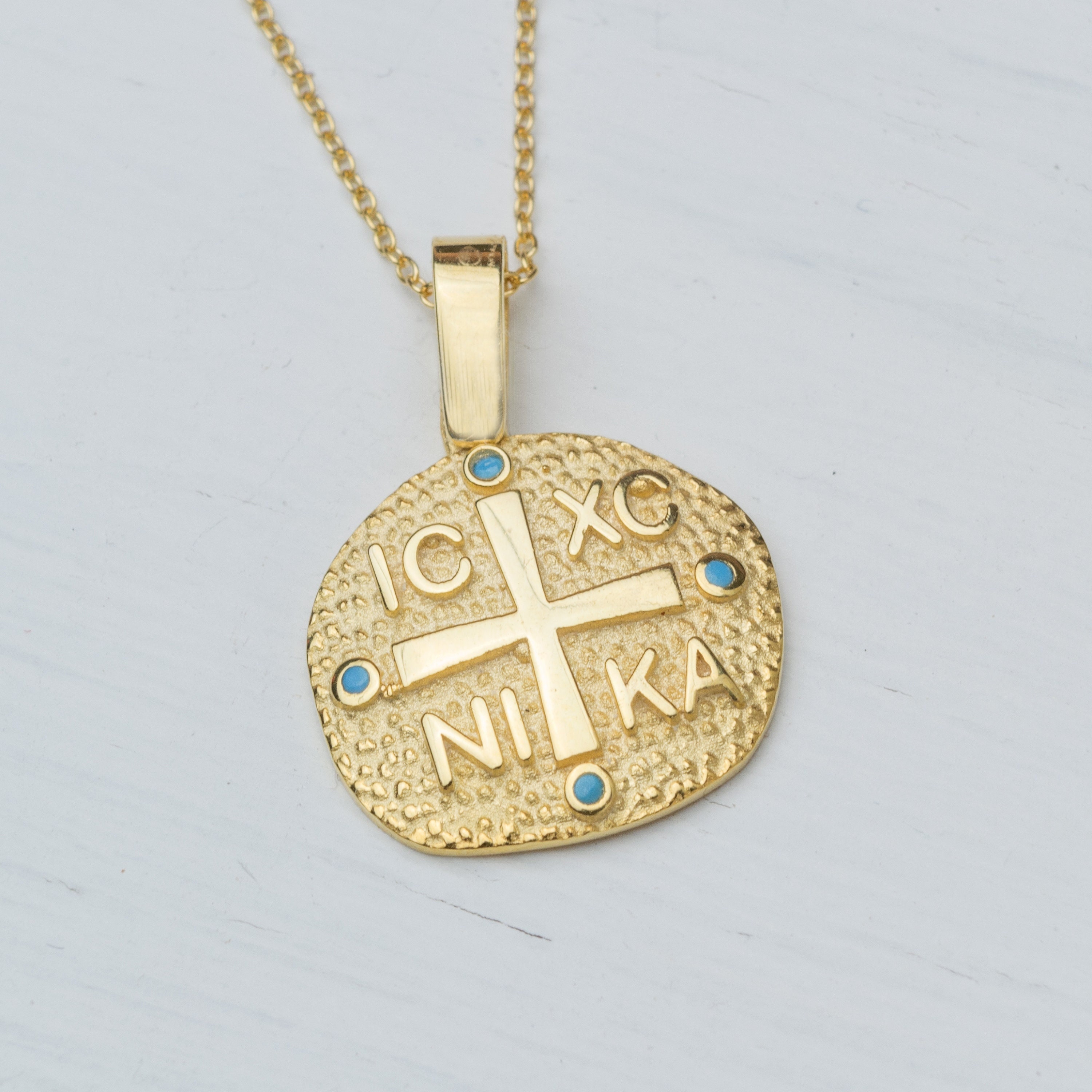 Constantine feather shop necklace