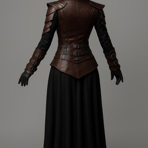 May include: A brown leather-like vest with shoulder armor and multiple buckles, worn over a black long-sleeved top and a long black skirt. The outfit includes a wide-brimmed black hat and black gloves. The overall style is reminiscent of fantasy or historical attire.