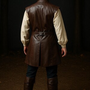 May include: A brown leather pirate costume, including a tricorn hat, vest, and boots. The vest has a belted waist and is worn over a cream-colored shirt. The costume is designed for historical reenactment or themed events.