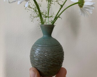 Self Care Handthrown and distorted ceramic budvase Porcelain clay and white glaze 22k Gold lettering