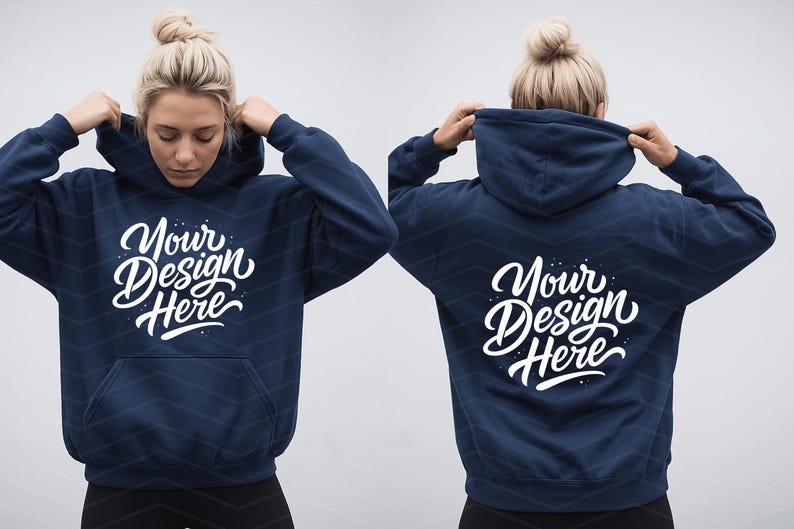 May include: Navy blue hoodie with the text "Your Design Here" in white script on the front and back. The hoodie has a front pocket and a hood. The model is wearing the hoodie.