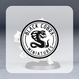 May include: A black and white miniature figure with a black cobra logo on the base. The logo reads "Black Cobra Miniatures" and features a stylized cobra with a raised hood.