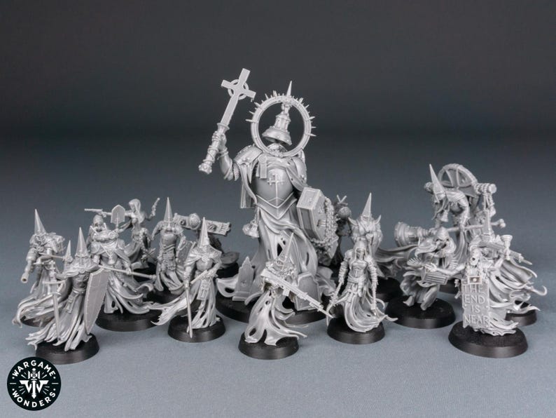 May include: A collection of unpainted miniature figurines, likely for tabletop gaming. The figures include armored characters with weapons, a large central figure with a cross, and figures with banners. The bases are black.