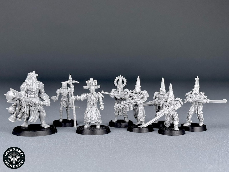 May include: A set of eight unpainted miniature figures, made of grey plastic, depicting a group of warriors with various weapons and armour. The figures are posed in a variety of dynamic stances, ready for battle.