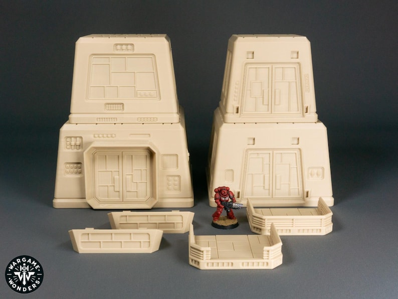 May include: A set of beige plastic building blocks for a tabletop wargame. The set includes two tall buildings with doors and windows, two short walls, and a small platform. A red plastic miniature figure stands on the platform.