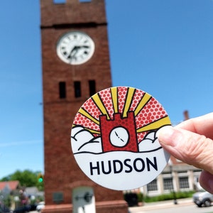 Hudson Ohio clock tower sticker, 3 inches round, colorful pop art stylized design.