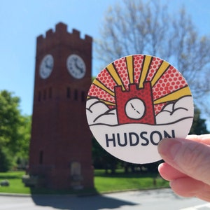 Hudson Ohio clock tower sticker, 3 inches round, colorful pop art stylized design.
