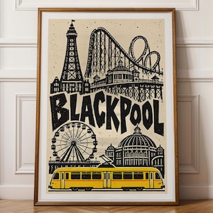 May include: A framed poster featuring a black ink illustration of the Blackpool Tower, a roller coaster, a Ferris wheel, and a domed building on a cream background. The word BLACKPOOL is printed in large black letters above a yellow tram.