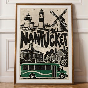 May include: A framed art print featuring black ink illustrations of lighthouses, a windmill, and buildings above the text NANTUCKET, with a green bus depicted at the bottom. The design is set against a light cream background.