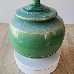 Handsome green glazed stoneware studio pottery lidded storage pot