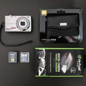 Nikon Coolpix S630 _ 12MP Digital Camera _ 7x Optical Vibration Reduction (VR) Zoom and 2.7 inch LCD _ 14 Scenes Modes