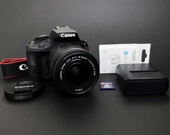 Canon EOS Rebel SL1 / 100D _ DSLR de 18.0 Mp _ Pantalla táctil _ con zoom Canon 18-55 mm STM