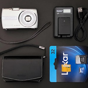 Olympus Stylus 1000  µ [mju:] Digital Camera _ 10Mp _ 20 Scenes Modes _ All Weather _ w/ Case.