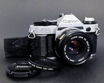 Canon AE-1 Program w/ Canon FD 50mm f:1.8 _ Exc. Read!