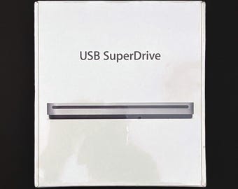 Apple USB SuperDrive _ CD/DVD Player & Burner (Mac / Windows) _ New / Sealed!