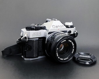 Programa Canon AE-1 con Canon FD 50 mm f:1.8 _ Exc.