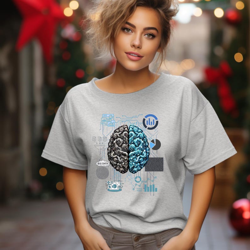 May include: A gray t-shirt with a graphic of a brain with a blue and black design. The brain is surrounded by circuit board-like patterns and the words "BIG DATA".