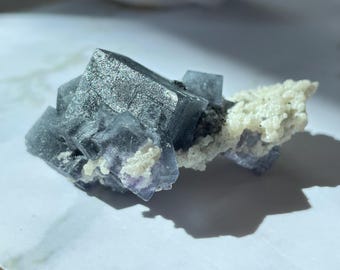 YGX Fluorites Full of Black Rutile - stunning lightly etched Yaogangxian fluorite with bismuthnite, wolframite, and mica. Strong UV reaction