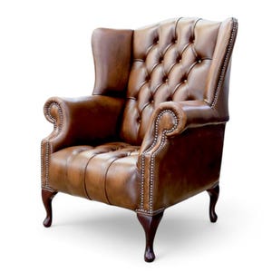 May include: A set of three ceramic mugs with a speckled, matte finish. Each mug is in a different colour: light blue, cream, and grey. The mugs have a simple, modern design and a comfortable handle.