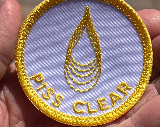 Burner De/Merit Badge PISS CLEAR, Iron-On