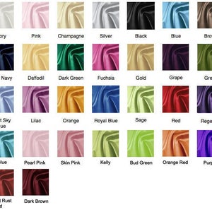 May include: A chart of 36 different colored fabric swatches. The swatches are arranged in a grid of six rows and six columns. Each swatch is labeled with a color name, such as "White", "Ivory", "Pink", "Champagne", "Silver", "Black", "Blue", "Brown", "Burgundy", "Chocolate", "Dark Navy", "Daffodil", "Dark Green", "Fuchsia", "Gold", "Grape", "Green", "Hunter", "Lavender", "Light Sky Blue", "Lilac", "Orange", "Royal Blue", "Sage", "Red", "Regency", "Watermelon", "Mint", "Ice Blue", "Pearl Pink", "Skin Pink", "Kelly", "Bud Green", "Orange Red", "Purple", "Light Plum", "Dark Royal Blue", "Bright Rust Red", and "Dark Brown".