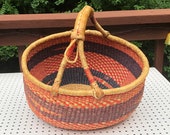 Large African Bolga Woven Market Basket, Striped Sections in Muted Brown, Orange and Blue, Leather Wrapped Handle, Flat Bottom