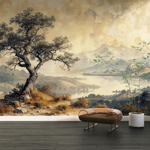 May include: A scenic mural depicts a landscape with a large tree, mountains, and a lake. The color palette is muted with browns, greens, and blues. A modern brown chair and a potted plant are in front of the mural. The floor is dark wood.