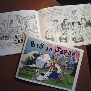 A picture of a small press comic called 'Big in Japan' comic and a view of the inside