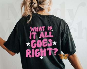May include: Black t-shirt with a pink graphic that says "What if it all goes right?" with white stars around the text. A butterfly is on the right side of the shirt.
