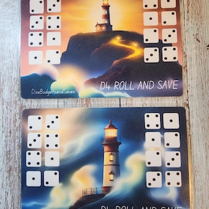 May include: Two game boards with a lighthouse and waves in the background. Each board has a grid of nine dice with different numbers of dots. The text "D4 ROLL AND SAVE" is printed on each board.
