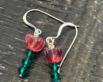 Purple flower Czech Glass Drop Earrings, green Swarovski Crystals stems. Silver wire.