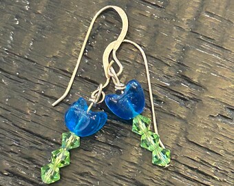 Darker Blue  flower Czech Glass Drop Earrings, green Swarovski Crystals stems. Silver wire.