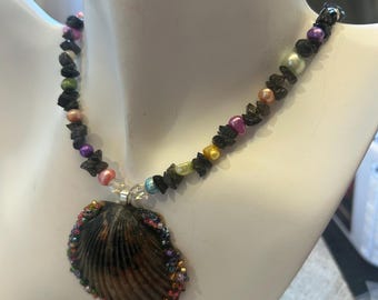 Decorated Shell Necklace, with seed beads,  Freshwater Pearls,  tekite chips, & Faceted Glass Beads
