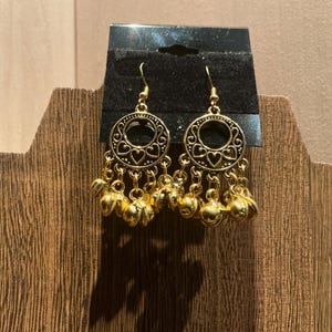 Golden dangle earrings. Beautiful jingle sound.