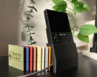 Base de carga minimalista para escritorio para el emulador de ladrillos TrimUI