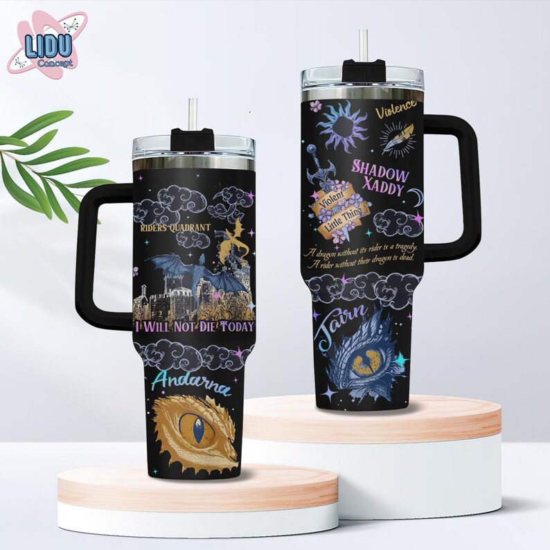 May include: Two black stainless steel tumblers with a dragon design. The tumbler on the left has a dragon with the text "Riders Quadrant" and "I Will Not Die Today". The tumbler on the right has a dragon with the text "Shadow Xaddy", "Violent Little Things", and "A dragon without its rider is a tragedy. A rider without their dragon is dead."