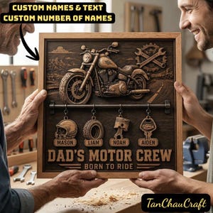 May include: Wooden sign with a carved motorcycle, gear, and wrench design. Below the motorcycle are four hanging charms with names. The sign reads "DAD'S MOTOR CREW" and "BORN TO RIDE". The text "CUSTOM NAMES & TEXT" is at the top.