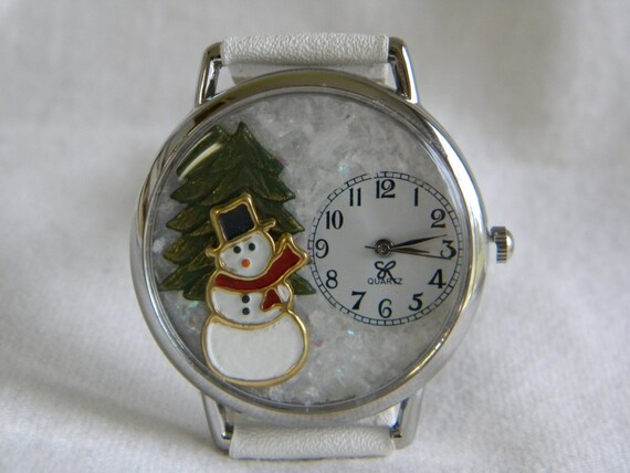 Snowman Watch With Evergreen Tree and Snowy Background  display picture 1
