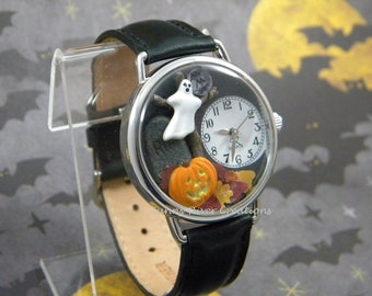 Spooky Halloween Watch with or without bats, it has glow-in-the-dark pumpkin face and edge of ghost, autumn leaves tombstone moon, tree