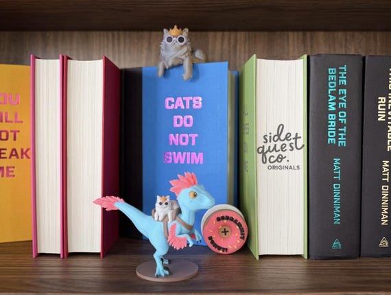 Dungeon Crawler Carl Mongo and Princess Donut Figure: Cat Bookshelf Decor and Fan Gift