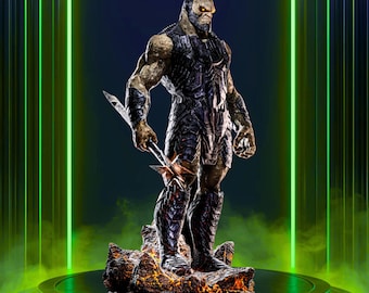 May include: A detailed statue of a muscular figure with a stern expression, holding a weapon. The figure is clad in dark armor and stands on a rocky base. The background features green neon accents and the word "Rilabe".