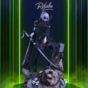 May include: A detailed figurine of a character from the game Nier: Automata, posed with two swords and a robotic companion. The figure is dressed in a black outfit, with white hair and a blindfold. The base is a rocky terrain with white flowers. The name "Rifabe" is written in white script.