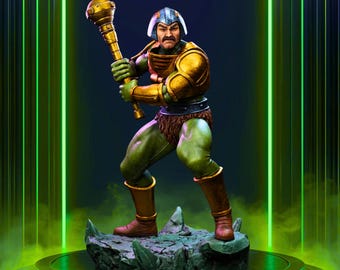 May include: A detailed figurine of a muscular character in a green and gold outfit, holding a golden mace. The figure stands on a rocky base, with the word "Rilabe" in white script above. The background is a dark blue with green neon accents.